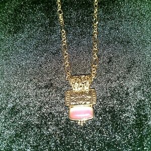 Pink genuine cat's eye and gold necklace